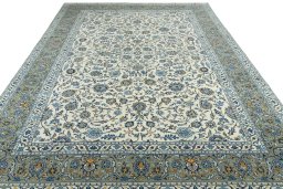 Surface texture of 2000s Kashan rug with natural Wool and intricate pattern