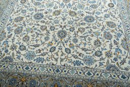 Close-up detail of 2000s Kashan rug from Iran / Persia showing Wool weave