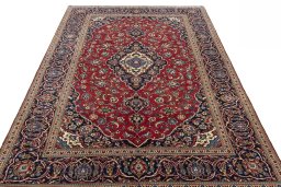 Surface texture of 2000s Kashan rug with natural Wool and intricate pattern