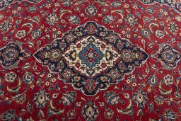 Central medallion detail of 2000s Kashan rug from Iran / Persia