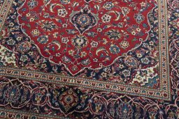Close-up detail of 2000s Kashan rug from Iran / Persia showing Wool weave