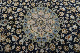 Central medallion detail of 2000s Kashan rug from Iran / Persia