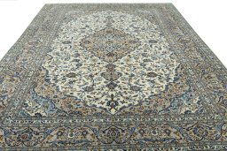 Surface texture of 2000s Kashan rug with natural Wool and intricate pattern