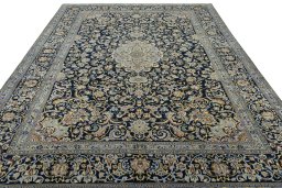 Surface texture of 2000s Kashan rug with natural Wool and intricate pattern