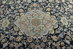 Central medallion detail of 2000s Kashan rug from Iran / Persia