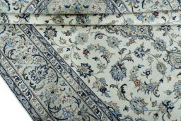 Close-up detail of 2000s Kashan rug from Iran / Persia showing Wool weave
