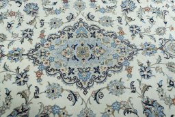 Central medallion detail of 2000s Kashan rug from Iran / Persia