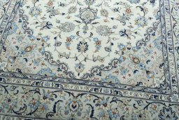 Close-up detail of 2000s Kashan rug from Iran / Persia showing Wool weave