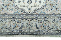 Full view of 2000s Kashan rug from Iran / Persia, 302 × 202 cm in Beige tones