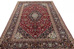 Surface texture of 2000s Kashan rug with natural Wool and intricate pattern