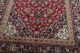 Close-up detail of 2000s Kashan rug from Iran / Persia showing Wool weave