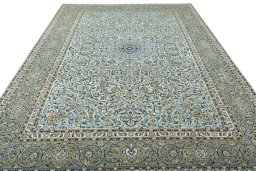 Surface texture of 2000s Kashan rug with natural Wool and intricate pattern