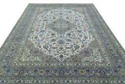 Surface texture of 2000s Kashan rug with natural Cork and intricate pattern