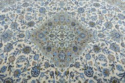 Central medallion detail of 2000s Kashan rug from Iran / Persia