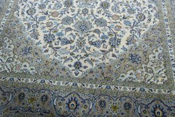 Close-up detail of 2000s Kashan rug from Iran / Persia showing Cork weave