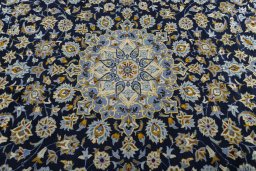 Central medallion detail of 2000s Kashan rug from Iran / Persia