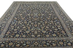Surface texture of 2000s Kashan rug with natural Wool and intricate pattern