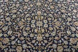 Central medallion detail of 2000s Kashan rug from Iran / Persia