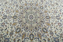 Central medallion detail of 2000s Kashan rug from Iran / Persia