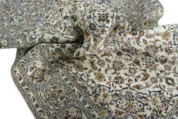 Surface texture of 2000s Kashan rug with natural Wool and intricate pattern