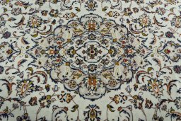 Central medallion detail of 2000s Kashan rug from Iran / Persia
