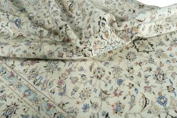 Surface texture of New Kashan rug with natural Wool and intricate pattern