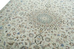 Backside of handmade New Kashan rug showing knot structure and weave density