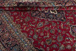 Close-up detail of 2000s Kashan rug from Iran / Persia showing Wool weave
