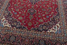 Close-up detail of 2000s Kashan rug from Iran / Persia showing Wool weave