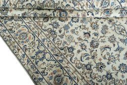 Close-up detail of 2000s Kashan rug from Iran / Persia showing Wool weave