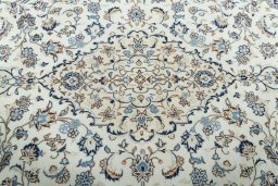 Central medallion detail of 2000s Kashan rug from Iran / Persia
