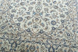 Close-up detail of 2000s Kashan rug from Iran / Persia showing Wool weave