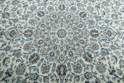 Central medallion detail of 2000s Kashan rug from Iran / Persia