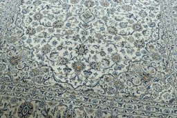 Close-up detail of 2000s Kashan rug from Iran / Persia showing Wool weave