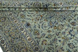 Close-up detail of 2000s Kashan rug from Iran / Persia showing Wool weave
