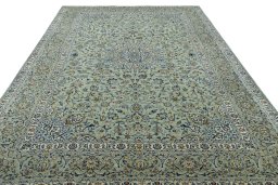 Surface texture of 2000s Kashan rug with natural Wool and intricate pattern