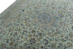 Backside of handmade 2000s Kashan rug showing knot structure and weave density