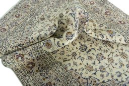 Surface texture of 2000s Kashan rug with natural Wool and intricate pattern