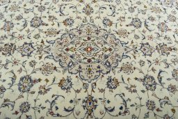 Central medallion detail of 2000s Kashan rug from Iran / Persia