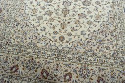Close-up detail of 2000s Kashan rug from Iran / Persia showing Wool weave