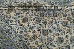 Close-up detail of 2000s Kashan rug from Iran / Persia showing Wool weave