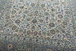 Close-up detail of 2000s Kashan rug from Iran / Persia showing Wool weave