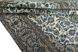Close-up detail of 2000s Kashan rug from Iran / Persia showing Wool weave