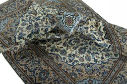 Surface texture of 2000s Kashan rug with natural Wool and intricate pattern