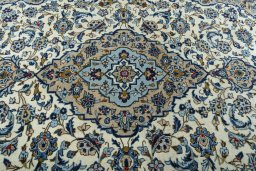 Central medallion detail of 2000s Kashan rug from Iran / Persia