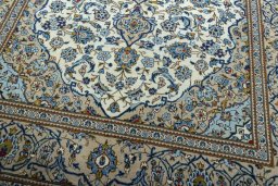 Close-up detail of 2000s Kashan rug from Iran / Persia showing Wool weave