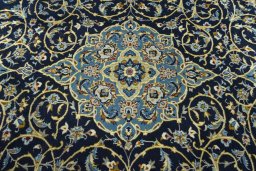 Central medallion detail of 2000s Kashan rug from Iran / Persia