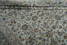 Close-up detail of 2000s Kashan rug from Iran / Persia showing Wool weave