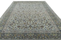 Surface texture of 2000s Kashan rug with natural Wool and intricate pattern