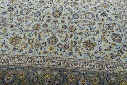 Close-up detail of 2000s Kashan rug from Iran / Persia showing Wool weave